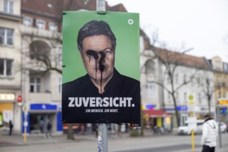 Berlin, Germany - 18 January 2025: A damaged election poster for the 2025 federal election of the