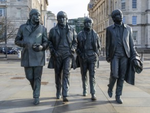 The Beatles statues sculpture by Anthony Edwards, Pier Head, Liverpool, England, UK