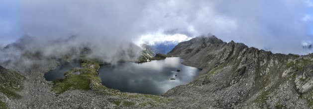 Mountain landscape with cloudy mountain peaks, mountain lakes Wangenitzsee and Kreuzsee, aerial