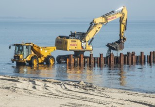 Excavator used in the repair and construction of bathing jetties at Ystads Saltsjöbad, the beach in