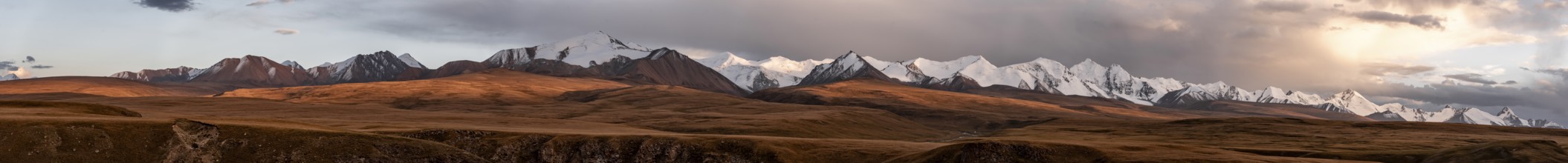 Panorama, Glaciated and snow-capped mountains, dramatic landscape at sunset, autumnal mountain
