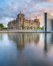 The Reichstag on the banks of the Spree in the evening light, Spreebogen, government district,