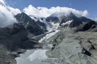 Aerial view, Alpine panorama, mountain landscape with glacier tongue and glacier lake, Glacier de
