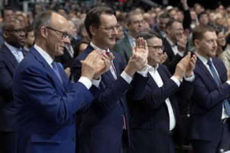 Friedrich Merz (party chairman and candidate for chancellor) and Hendrik Wüst (Minister President