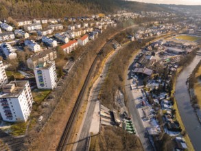 Industrial urban area with railway and river along residential buildings, Nagold, Black Forest,