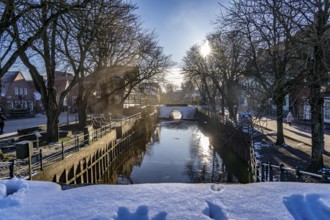 The fishing village of Greetsiel, municipality of Krummhörn, the old sluice, in winter, Lower