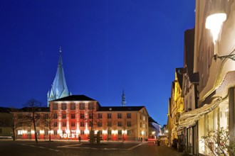 Illuminated town hall with St Patrokli Cathedral in the evening at the Winter Radiance Festival of