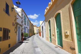 Colourful alley in the historic old town of Agüimes, Gran Canaria, Canary Islands, Spain, Europe