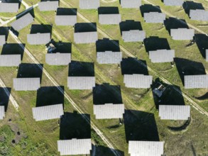 Rows of solar panels at a photovoltaic plant near town of Espejo. Aerial view. Drone shot. Córdoba