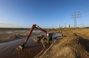 Dinslaken, North Rhine-Westphalia, Germany, New Emscher estuary into the Rhine. Excavator in the