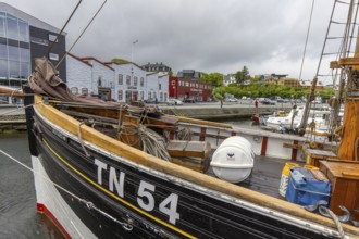 Old wooden fishing boat in harbour of Tórshavn, Thorshavn port on the island Streymoy, Faroe