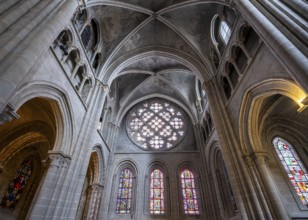 Interior view with stained glass windows of Notre Dame de Lausanne Cathedral, Lausanne, Vaud,