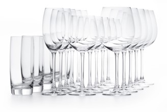 Different empty glasses in front of a white background, studio shot