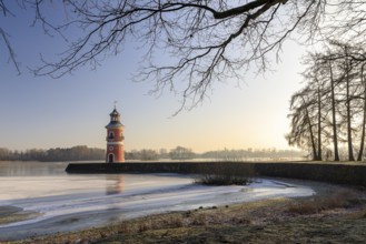 Pier with lighthouse on the large pond near the Fasanenschlößchen, Moritzburg, Saxony, Germany,