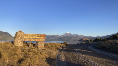 Dirt road to the entrance of Lanin National Park with the Lanin Volcano, Patagonia, Argentina,