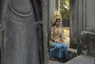 Young woman dressed as a temple dancer, Apsara, Bayon Temple, Angkor Wat, Angkor, UNESCO World