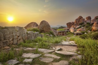 Ancient ruins in Hampi on sunset. Above Hampi Bazaar, Hampi, Karnataka, India, Asia