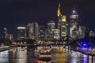 The lights of Frankfurt's banking skyline shine in the evening., Osthafen, Frankfurt am Main,
