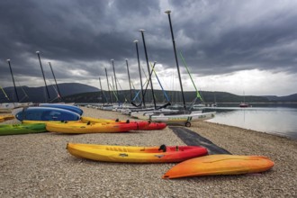 Boats on the beach in Sainte Croix du Verdon, Lac de Sainte-Croix, thunderstorm atmosphere,