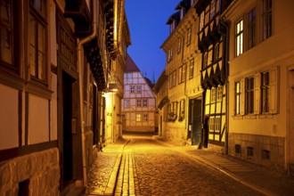 Half-timbered houses in a narrow street with cobblestones, Old Town in the evening, World Heritage