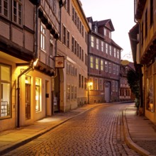 Half-timbered houses in a narrow street with cobblestones, Old Town in the evening, World Heritage