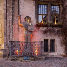 Illuminated Roland statue at the town hall at dusk, Quedlinburg, Saxony-Anhalt, Germany, Europe