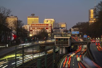 Motorway A40, Ruhr expressway, heavy traffic jam, rush hour, city passage in Essen, skyline of the