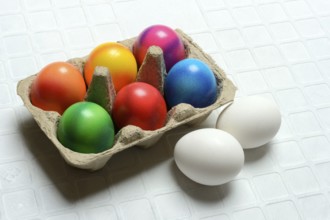 Colourful Easter eggs in packaging, Easter celebration