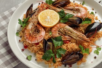 Seafood paella, shrimp and mussels risotto, rice, homemade, top view, no people
