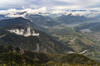 View from the summit of Mount Pizzo di Levico to the lakes in the Sugana Valley, Trentino, Italy,