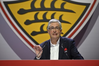 President Dietmar Allgaier VfB Stuttgart holds speech at the podium, gestures, coat of arms, logo,