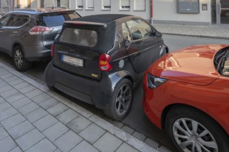 A Smart car parked across the road in a parking space, Bavaria, Germany, Europe