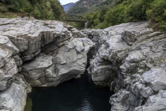 Rocks, granite rock formations in the Maggia River near Ponte Brolla, in the Maggia Valley, Valle