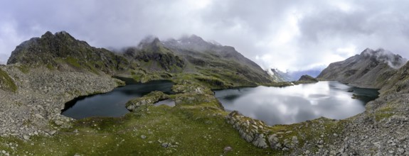 Mountain landscape with cloudy peaks and mountain lakes Wangenitzsee and Kreuzsee, Schober Group,