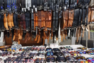 Sunday market, sunglasses and leather belts, souvenirs at a market stall in the old town, Teguise,