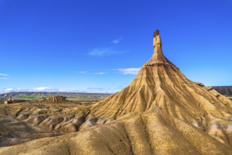 Eroded rock formations create a dramatic landscape in the bardenas reales desert, navarre, spain,