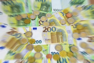 Close-up of euro banknotes and euro coins