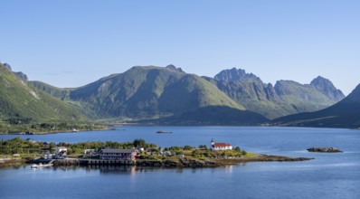 Place and small church Sildpollnes Kirke at the fjord Austnesfjorden, idyllic Norwegian fjord