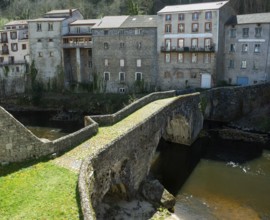 Olliergues village. Old bridge on river Dore. Natural regional park of Livradois Forez. Puy de Dome