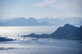 Mountain peak and fjord Austensfjorden, fjord landscape and sea, view from the summit of