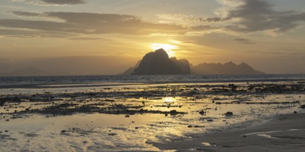 Structures in the sand, sunrise at low tide on the beach of Koh Ngai Island, Andaman Sea, Satun