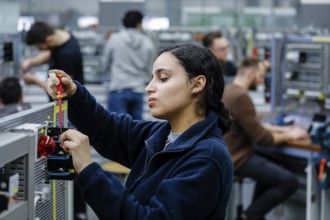Remscheid, North Rhine-Westphalia, Germany - Trainee woman in electrical professions, an industrial