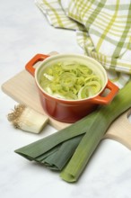 Leek, leek sticks and leek rings in a bowl