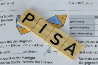PISA study Symbolic image: Maths problems in the textbook of a comprehensive school pupil show the