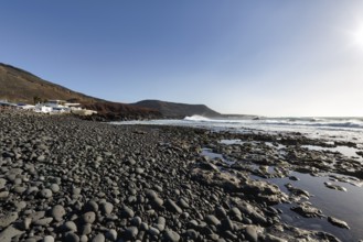 Rocky west coast, black lava coast, coastline, sunbeams, El Golfo, Yaiza, Lanzarote, Spain, Europe