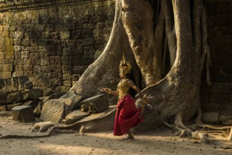 Young woman dressed as a temple dancer, Apsara, Ta Prohm, Angkor Wat, Angkor, UNESCO World Heritage