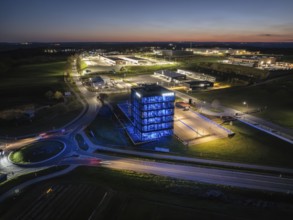Illuminated building in a city at night, taken from a bird's eye view, Mobex, Nagold, Black Forest,