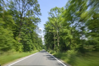 Symbolic image for speeding speeding dangerous driving at excessive speed by speeders on narrow