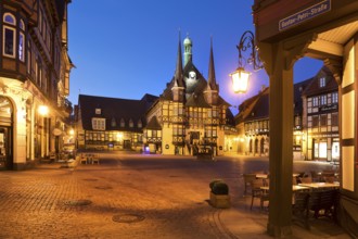 Market square with atmospherically illuminated town hall in the evening, Wernigerode, Harz,