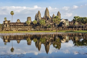 Famous Cambodian landmark and tourist attraction Angkor Wat with reflection in water. Cambodia,